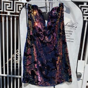 Sequence mini dress with a deep v neckline